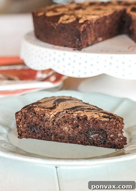 Healthy Paleo Banana Cocoa Cake with almond butter swirl, made with gluten-free flours.
