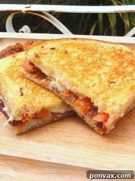 Close-up of the delicious Bacon, Tomato, & Roasted Garlic Grilled Cheese