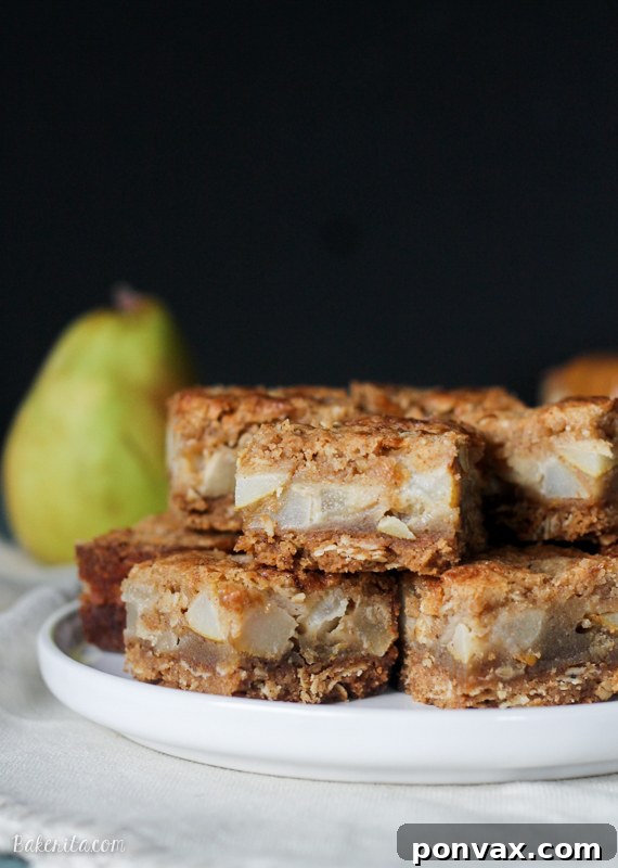 Brown Butter Pear Bars with a detailed view of the shortbread crust and fruit filling