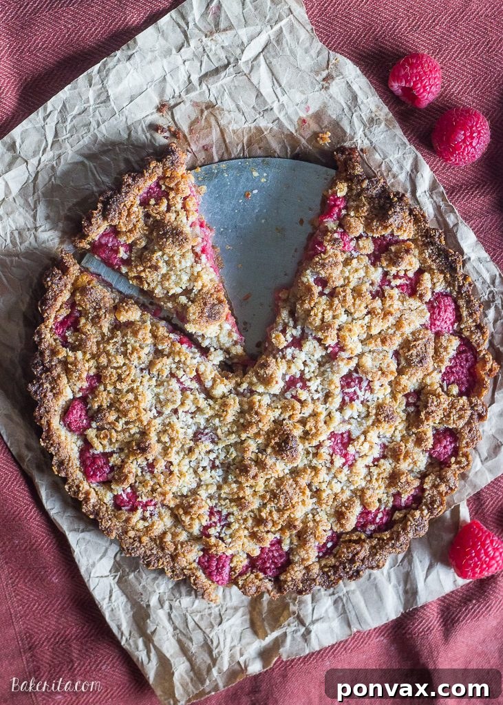 Raspberry Coconut Crumble Tart This Raspberry Coconut Crumble Tart has an almond coconut crust that doubles as a crumble topping, filled with fresh raspberries! This easy recipe is Paleo-friendly, gluten free, refined sugar free, and vegan.