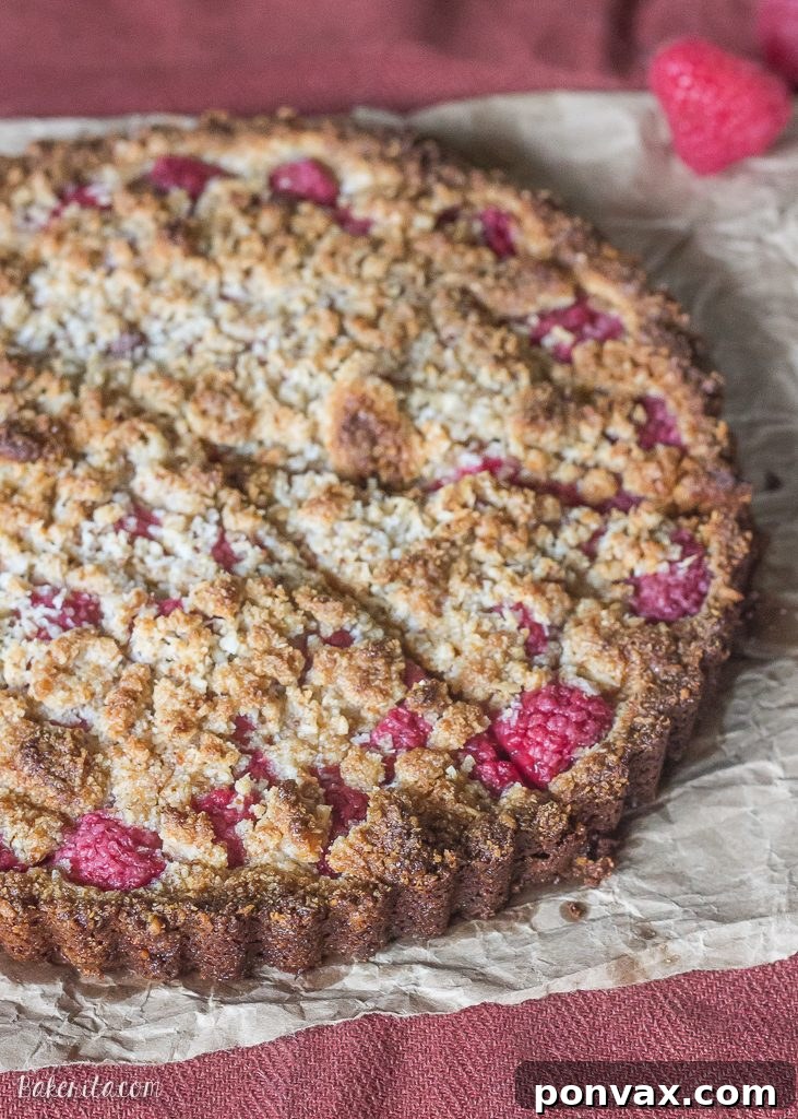 Paleo Gluten Free Vegan Raspberry Coconut Crumble Tart 4 This Raspberry Coconut Crumble Tart has an almond coconut crust that doubles as a crumble topping, filled with fresh raspberries! This easy recipe is Paleo-friendly, gluten free, refined sugar free, and vegan.