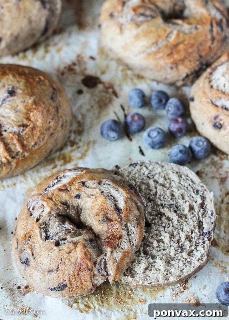 A stack of golden, sweet blueberry bagels, ready to be enjoyed.