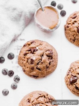 These naturally Flourless Almond Butter Chocolate Chip Cookies are so tender that they melt in your mouth! These flavorful cookies have just 5 ingredients and they are gluten-free, Paleo, refined sugar-free and vegan.