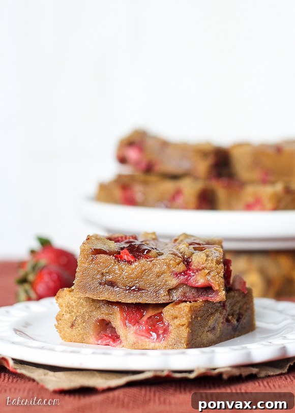 Overhead view of a tray of Peanut Butter & Jelly Bars, ready for slicing.