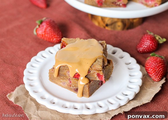 A single Peanut Butter & Jelly Bar, highlighting its chewy texture and delicious fruit swirl.