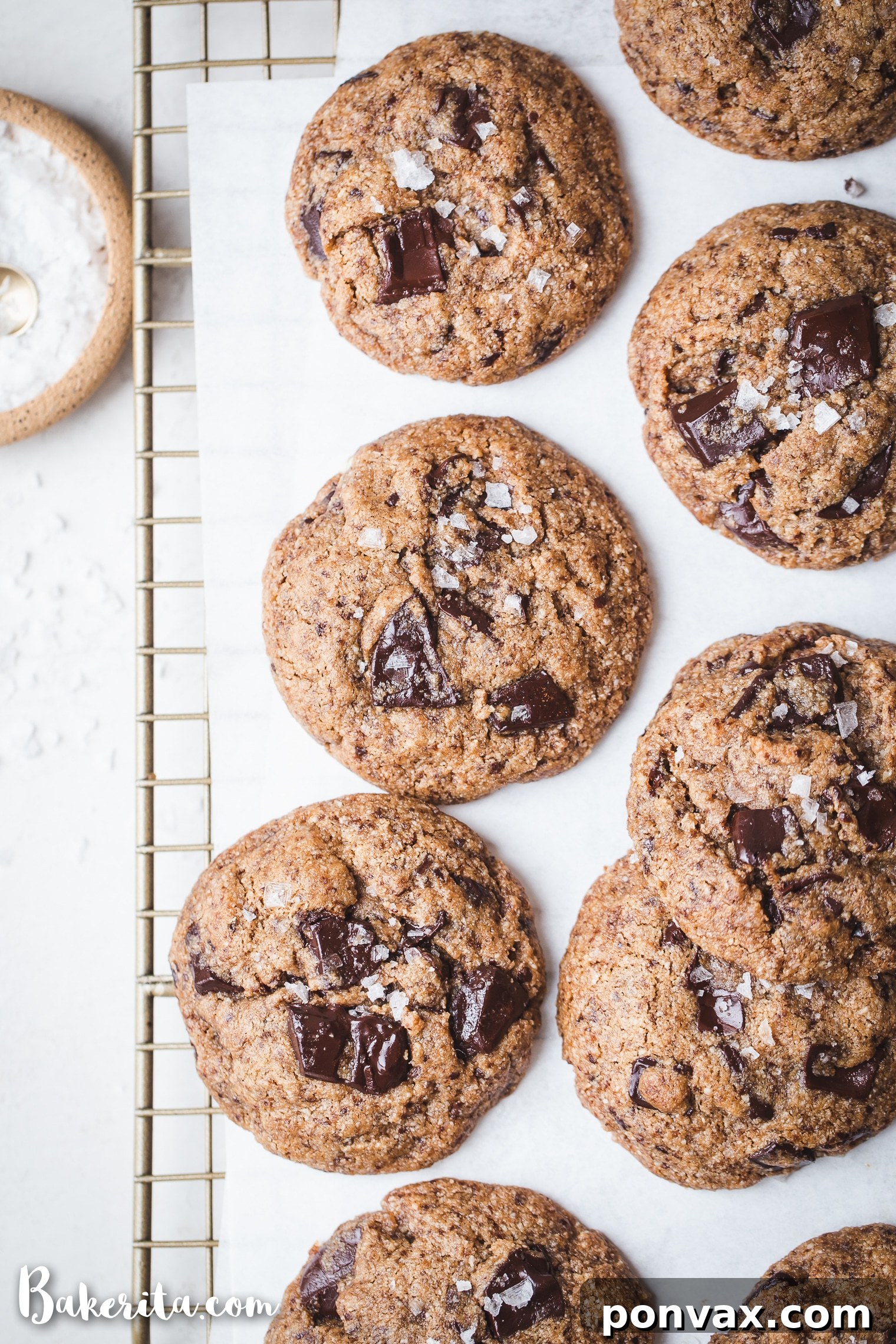 Irresistible Paleo Chocolate Chip Cookies Vegan Friendly 2 A plate of golden brown Paleo Chocolate Chip Cookies with melted chocolate chunks.