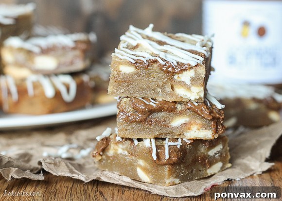 These Browned Butter White Chocolate Blondies with CookieNut Butter Swirl are quick, easy, and delicious! They come together in one bowl, and you'll love the unique CookieNut Butter swirl.