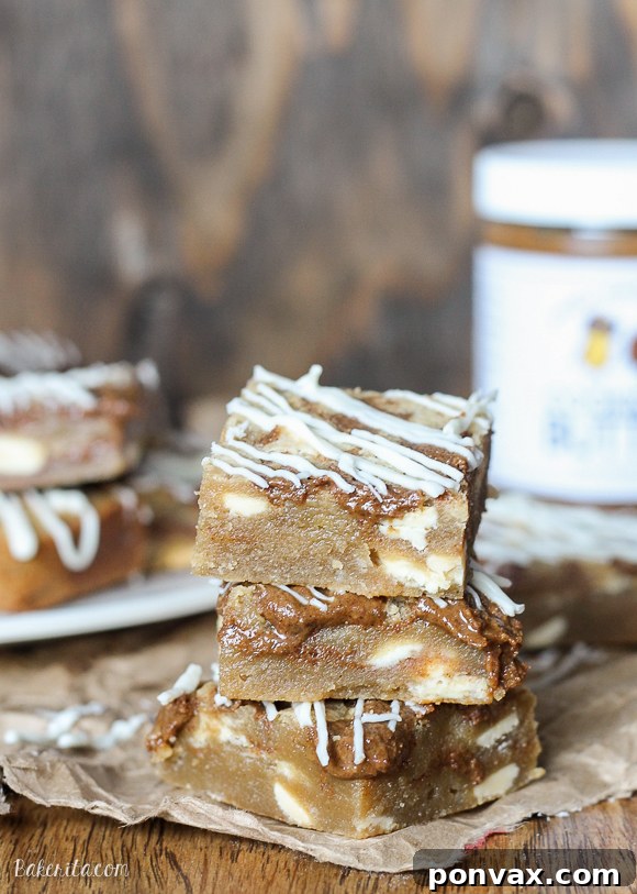 These Browned Butter White Chocolate Blondies with CookieNut Butter Swirl are quick, easy, and delicious! They come together in one bowl, and you'll love the unique CookieNut Butter swirl.