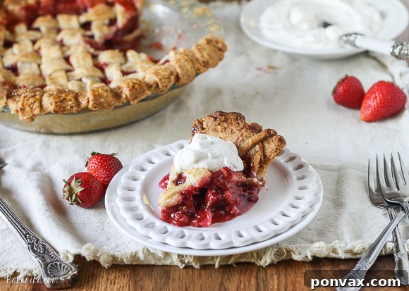 Sweet Tart Berry Rhubarb Pie 5 This Berry Rhubarb Pie features fresh strawberries and raspberries, which pair perfectly with the tart rhubarb to create a sweet and tart pie that'll have everyone asking for seconds!