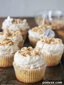 If you like Cheerios, you'll love these Honey Nut Cheerio Cupcakes! A soft honey cupcake made with cereal infused milk is topped with a Honey Nut Cheerio buttercream to create a treat you'll love.