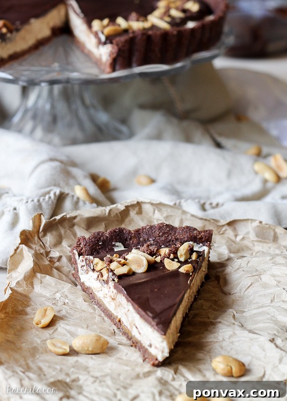 This No Bake Chocolate Peanut Butter Tart has a rich peanut butter filling topped with chocolate ganache for a decadent treat you won't believe is gluten free, refined sugar free, and vegan!