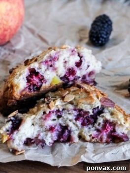 Summer Peach and Blackberry Scones 2 Delicious Blackberry Peach Scones on a baking sheet
