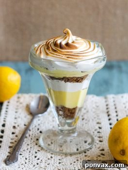 These Lemon Meringue Pie Parfaits are a no-bake dessert that will be your new summer favorite! Lemon curd, graham cracker crumbs, and meringue makes the best individual treats.