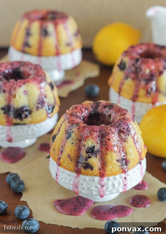 These Mini Lemon Blueberry Bundt Cakes are dripping with fruity blueberry glaze. These small bundt cakes are ideal for individual servings.