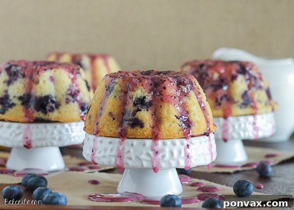 Close-up of Mini Lemon Blueberry Bundt Cakes, showcasing the moist crumb and juicy blueberries.