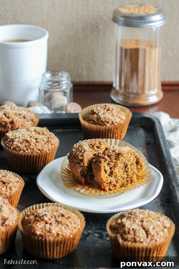 A second vibrant image of freshly baked Vegan Pumpkin Spice Latte Muffins, showcasing their inviting texture and golden tops, ready to be enjoyed.