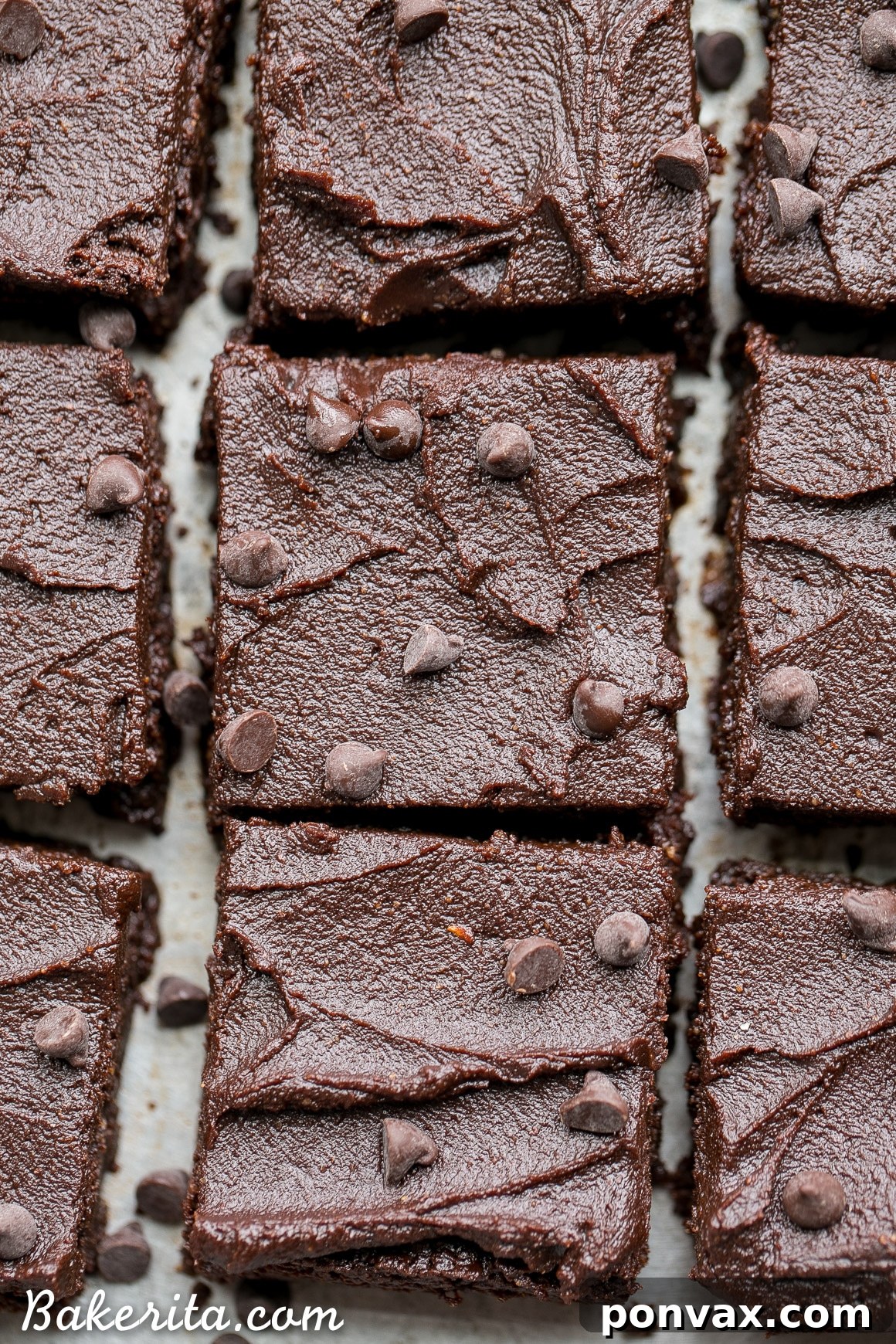 Delicious gluten-free fudge brownies cooling on a wire rack, ready for frosting