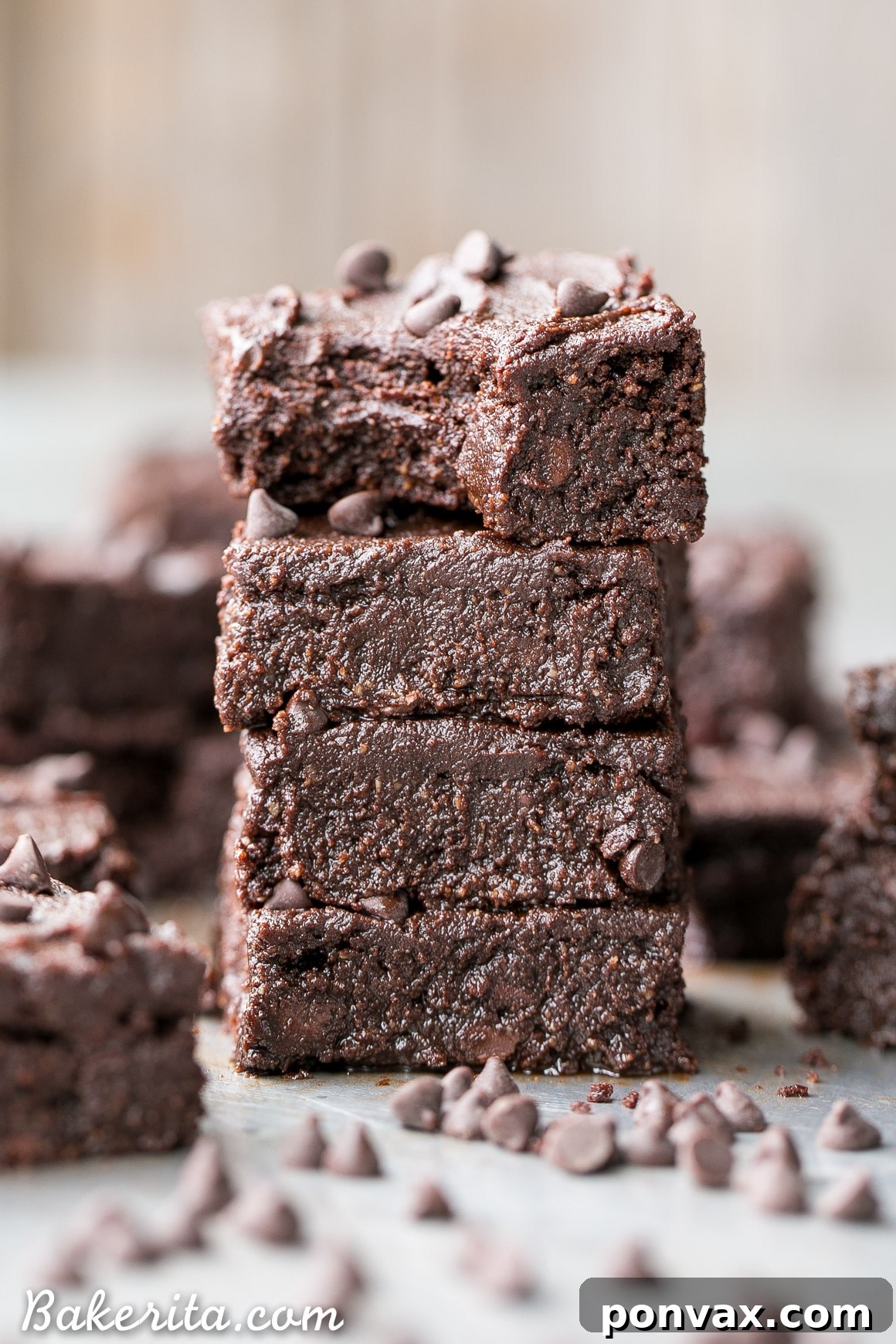 Raw batter of gluten-free fudge brownies with chocolate chips, ready for baking