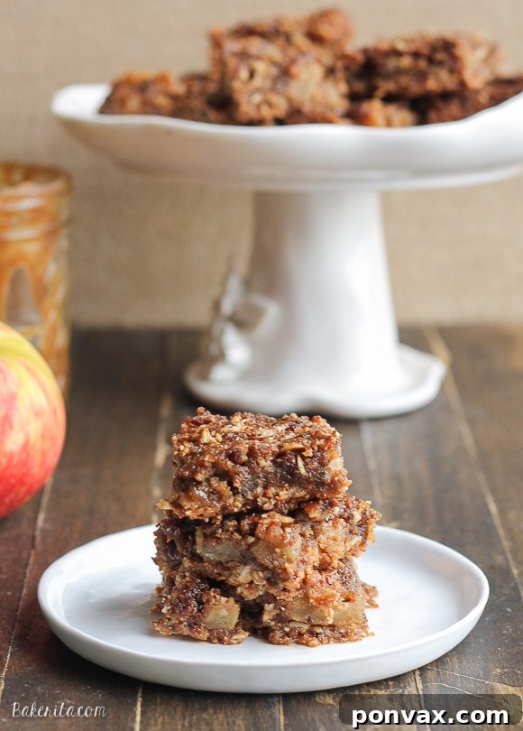 Delicious gluten-free and vegan Caramel Apple Crumb Bars ready to be served, highlighting their crumbly texture and sweet apple filling.