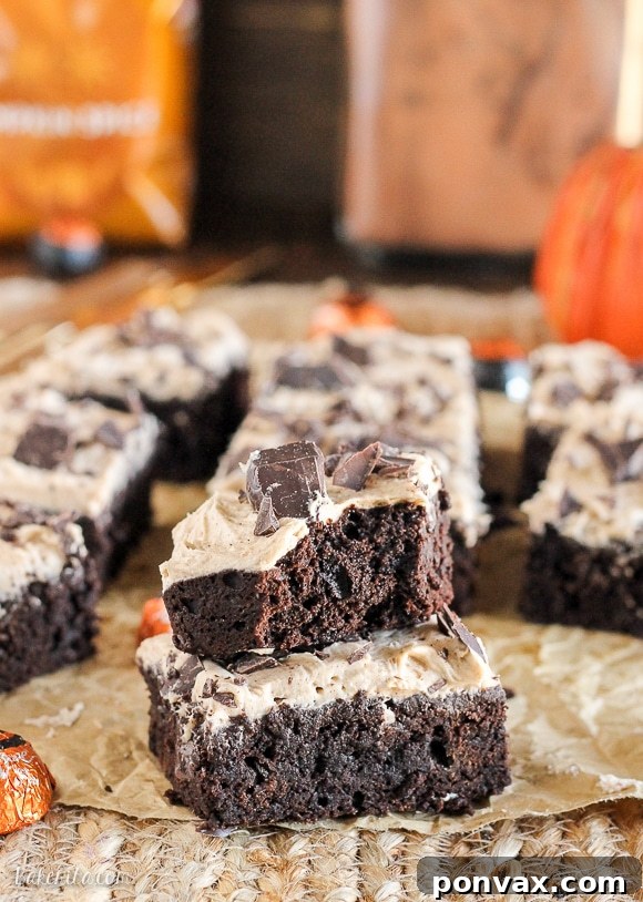 Autumn Spiced Latte Brownies 2 Delicious Pumpkin Spice Latte Brownies with whipped frosting and chocolate pumpkins, perfect for fall