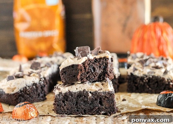 Autumn Spiced Latte Brownies 3 Close-up of a Pumpkin Spice Latte Brownie with thick, fluffy frosting