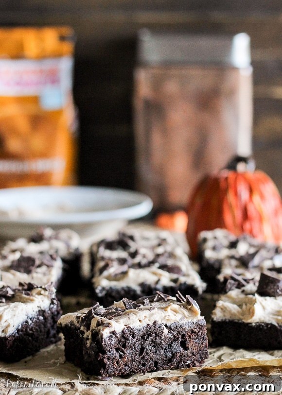 Autumn Spiced Latte Brownies 4 Array of Pumpkin Spice Latte Brownies on a wooden surface, ready to be enjoyed