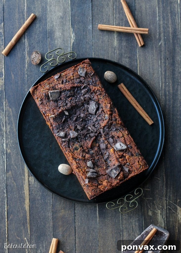 Delicious Paleo Chocolate Chip Pumpkin Bread, a good-for-you twist on a fall favorite, moist and full of chocolate chunks, made with coconut flour and almond butter.
