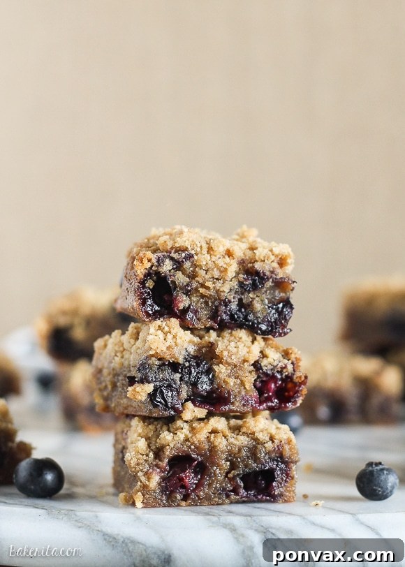 Bowl of freshly prepared blueberry blondie batter with visible browned butter specks