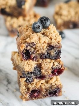 Delicious Blueberry Crumb Blondies with a rich brown butter base and crumb topping