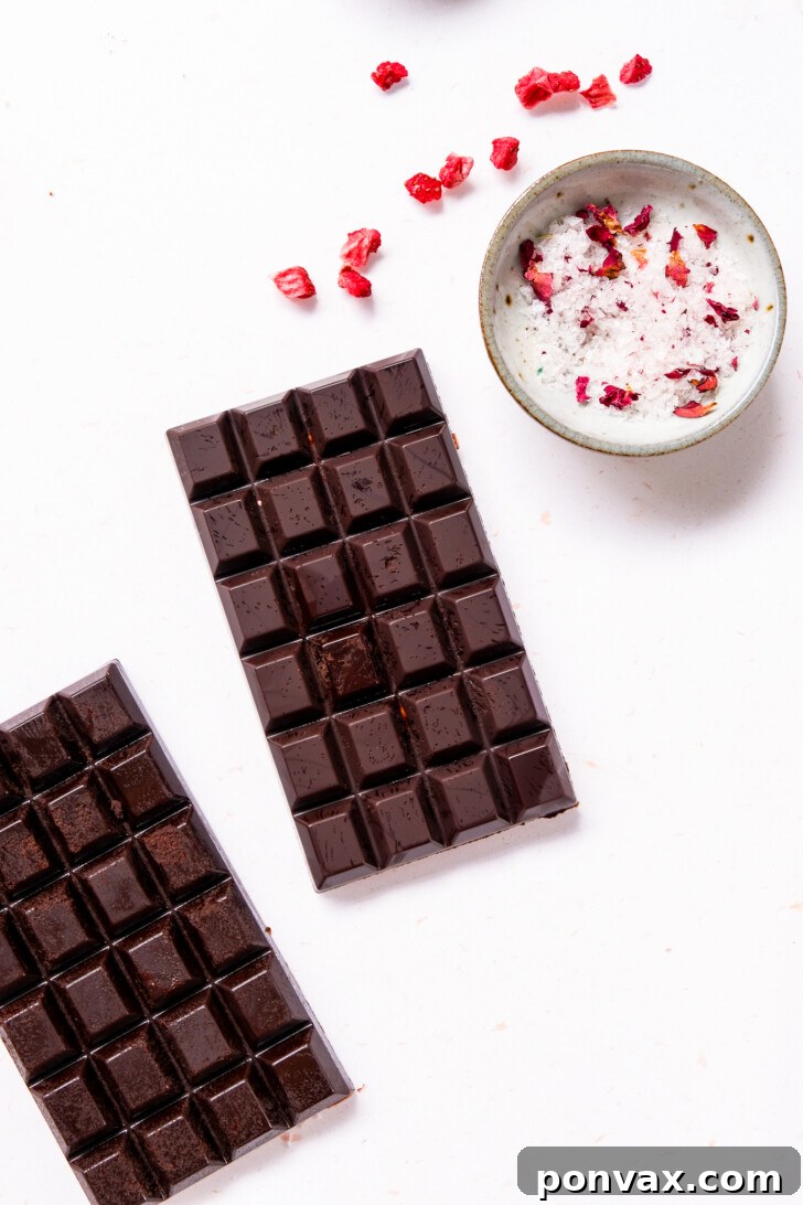 Homemade chocolate bars stored in a container in the fridge.