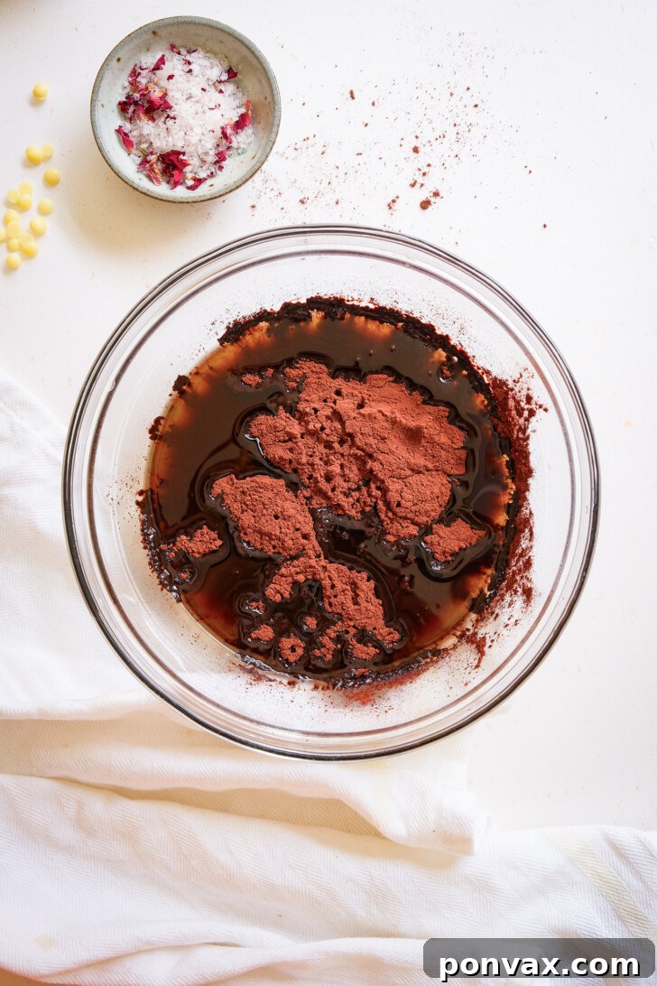 Step-by-step image of whisking chocolate mixture.