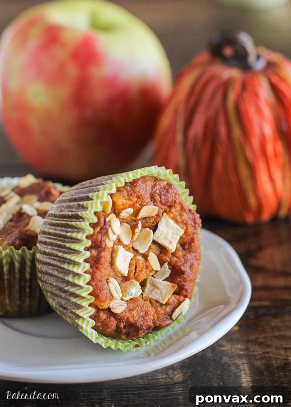 Cozy Gluten-Free Apple Pumpkin Spice Muffins 5 Basket of Gluten-Free Vegan Pumpkin Apple Muffins with fresh apples and pumpkin in the background.