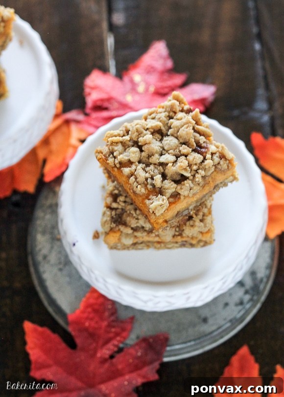 These Pumpkin Cheesecake Crumb Bars have a crumble crust full=
