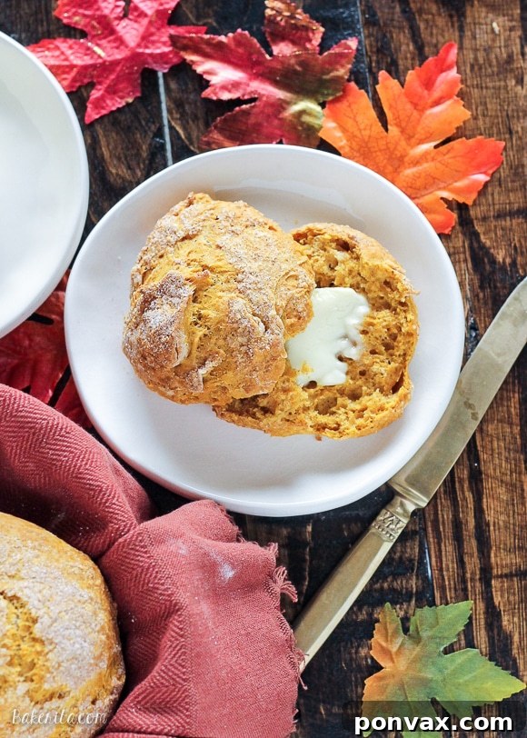 Close-up of golden Cinnamon Sugar Pumpkin Rolls, warm and inviting, perfect for a cozy fall morning.