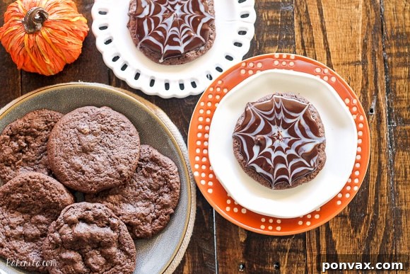 Exquisite Chocolate Spiderweb Cookies 3 These Ultimate Chocolate Spiderweb Cookies are perfect for Halloween! They're double chocolate cookies, full of chocolate chunks, and topped with white and dark chocolate ganache.