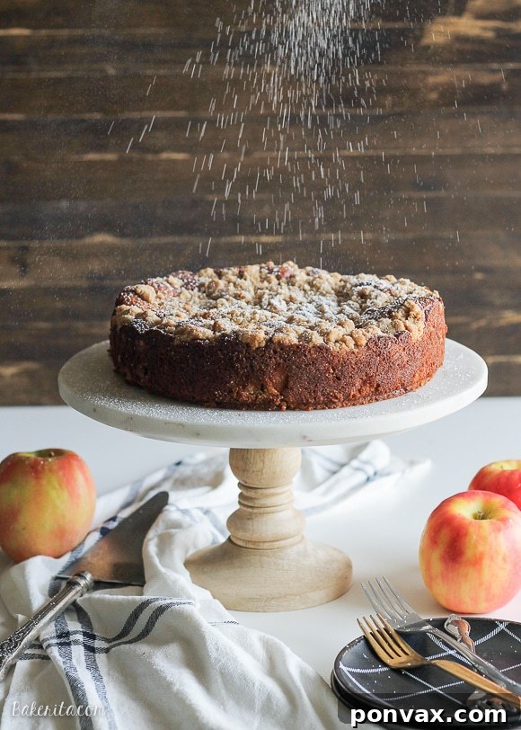 Spiced Apple Crumble Delight 2 This Apple Crumb Cake is full of warm spices, apple chunks, and Greek yogurt to keep it soft! This recipe has a super thick crumb layer and is a perfect fall cake.