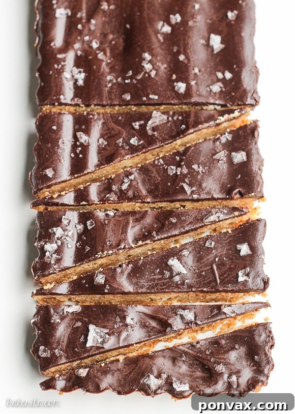 Irresistible Brown Butter Shortbread cookies topped with rich dark chocolate and a sprinkle of flaky sea salt, perfect for holiday parties.