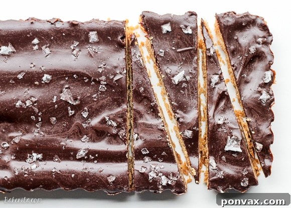 A large stack of unsalted butter sticks, essential for rich brown butter shortbread recipes.