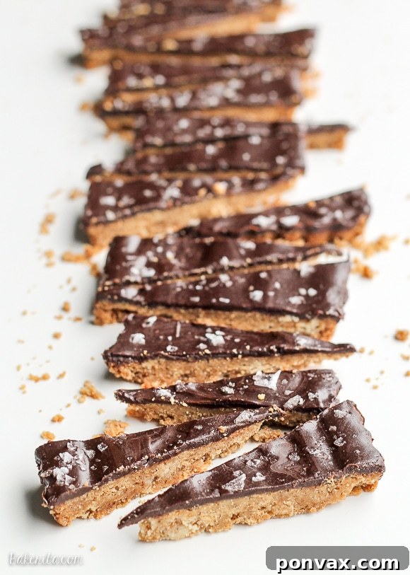 Crisp baked brown butter shortbread squares, awaiting their dark chocolate topping and flaky sea salt.