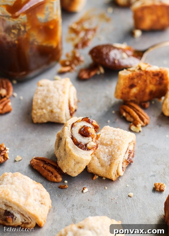 These Apple Butter Rugelach will be gone before you know it - you can't eat just one! Butter and cream cheese make the rugelach dough super tender and flaky.
